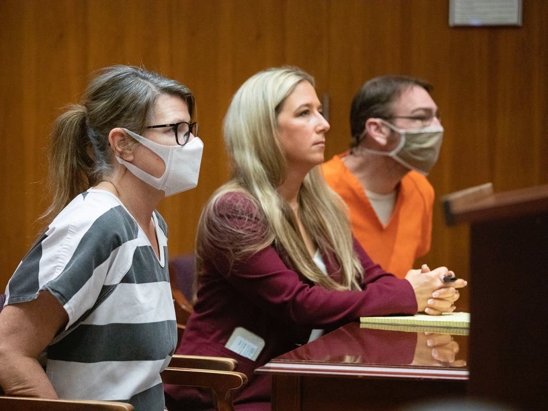 The parents were each charged with four counts of involuntary manslaughter in connection to the school shooting that left four students dead and seven other people wounded.