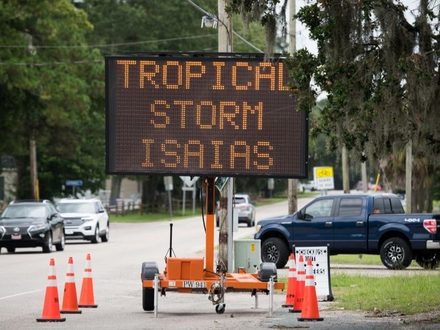 Two drivers were rescued in Charles County, Maryland, on Tuesday morning after their vehicles were swept off the road due to rising flood waters caused by Tropical Storm Isaias.