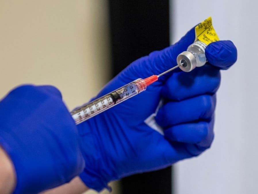 Advocate Condell Medical Center in Libertyville is temporarily suspending its efforts to vaccinate employees after several experienced adverse reactions to the new coronavirus vaccine. 