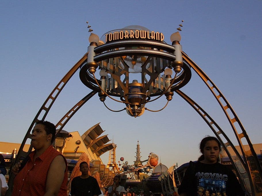 People walk through Tomorrowland in Walt Disney World's Magic Kingdom. An 83-year-old Florida man died last month after suffering a possible heart attack while on a park ride.