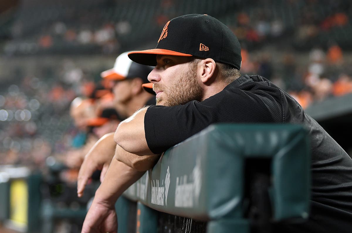 Chris Davis #19 of the Baltimore Orioles watches the game against Houston Astros at Oriole Park on Sept. 28, 2018.