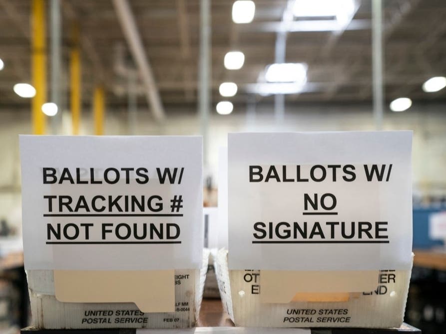 The ballot canvass for mail-in and absentee ballots began on Oct. 1 in Maryland, the earliest in the country. Signage for ballots with errors is seen in a warehouse at the Anne Arundel County Board of Elections headquarters Oct. 7 in Glen Burnie.