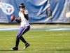 Baltimore Ravens quarterback Lamar Jackson looks to pass during the first half of the AFC wild-card playoff game against the Tennessee Titans at Nissan Stadium in Nashville on Sunday, Jan. 10.