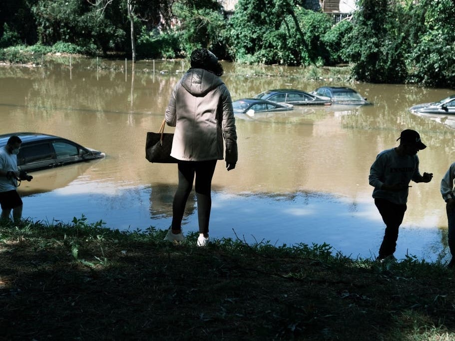 Cars were abandoned on the flooded Major Deegan Expressway following a night of heavy rain from the remnants of Hurricane Ida on Sept. 2 in the Bronx borough of New York City.