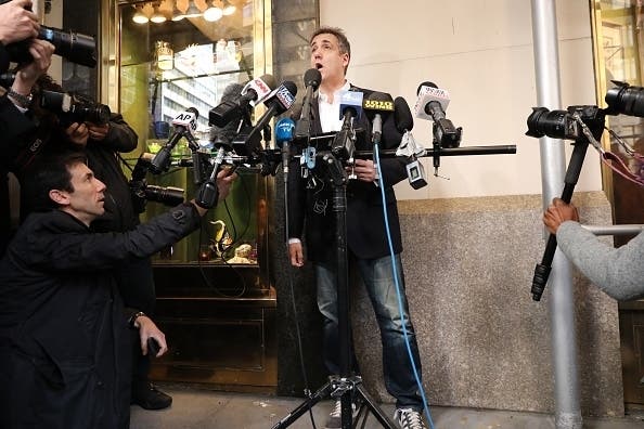 Michael Cohen speaks to the media before departing his Manhattan apartment for prison on May 06, 2019, in New York City.