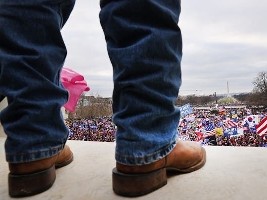 Thousands of Donald Trump supporters storm the United States Capitol building following a "Stop the Steal" rally on Jan. 6 in Washington, D.C.