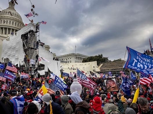​Trump supporters clash with police and security forces as people try to storm the U.S. Capitol on Jan. 6, 2021, in Washington, DC. 