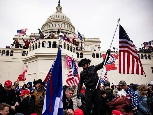 Pro-Trump supporters storm the U.S. Capitol following a rally with President Donald Trump on Jan. 6 in Washington, DC. Trump supporters gathered in the nation's capital to protest the ratification of President-elect Joe Biden's Electoral College victory.