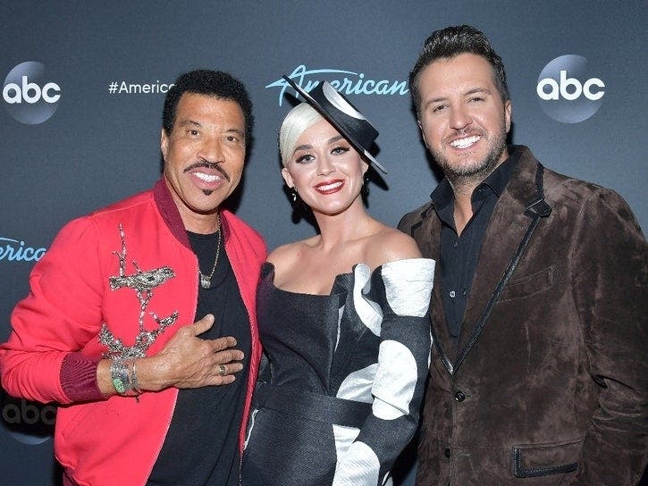 Katy Perry (center) and Luke Bryan (right) were seen re-enacting the scene from Titanic at The Wharf recently. Also pictured is fellow "American Idol" judge Lionel Ritchie. 