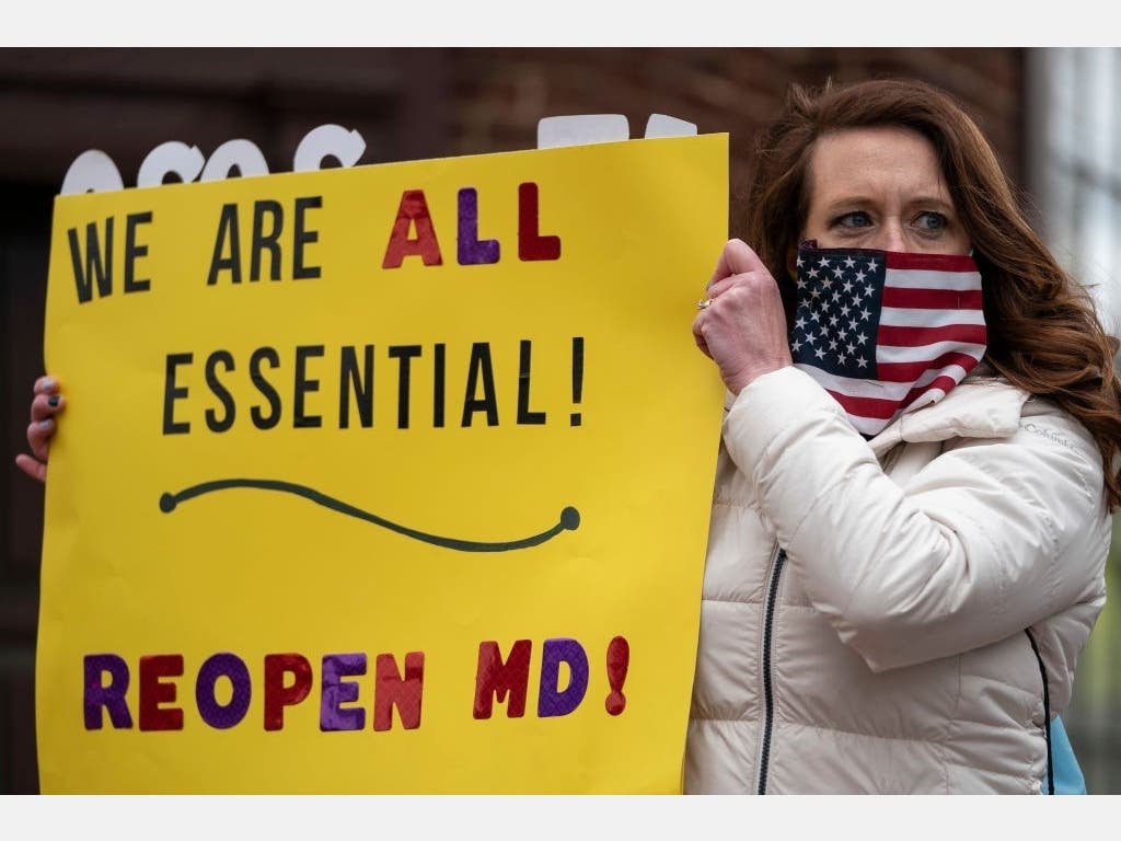 Protesters with the group Reopen Maryland rally April 18 near the State House to call on Maryland's governor to lift the stay-at-home order and reopen the economy. Most protesters rallied from inside their cars as they caused gridlock.