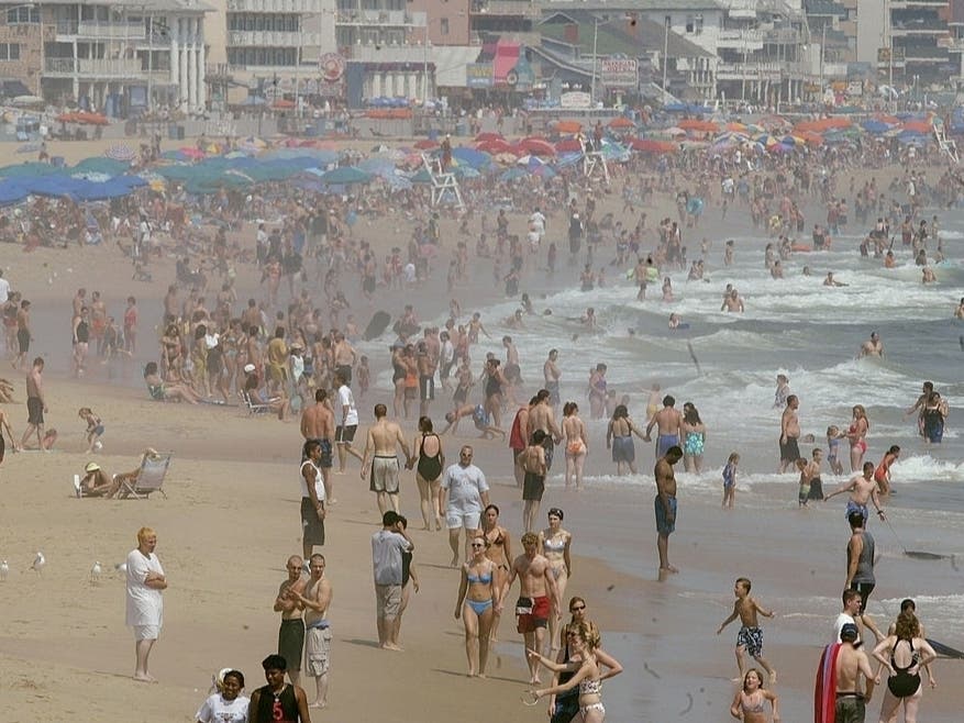 Beachgoers play in the surf at Ocean City, Maryland, several years ago. Patch readers surveyed mostly said they plan to stay home this Memorial Day weekend because of the coronavirus pandemic.