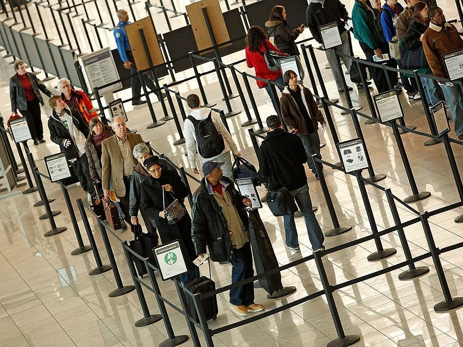 Passengers in line on their way to a Transportation Security Administration screening area at Baltimore Washington International Airport. Traffic at the airport has started to increase as coronavirus cases drop.