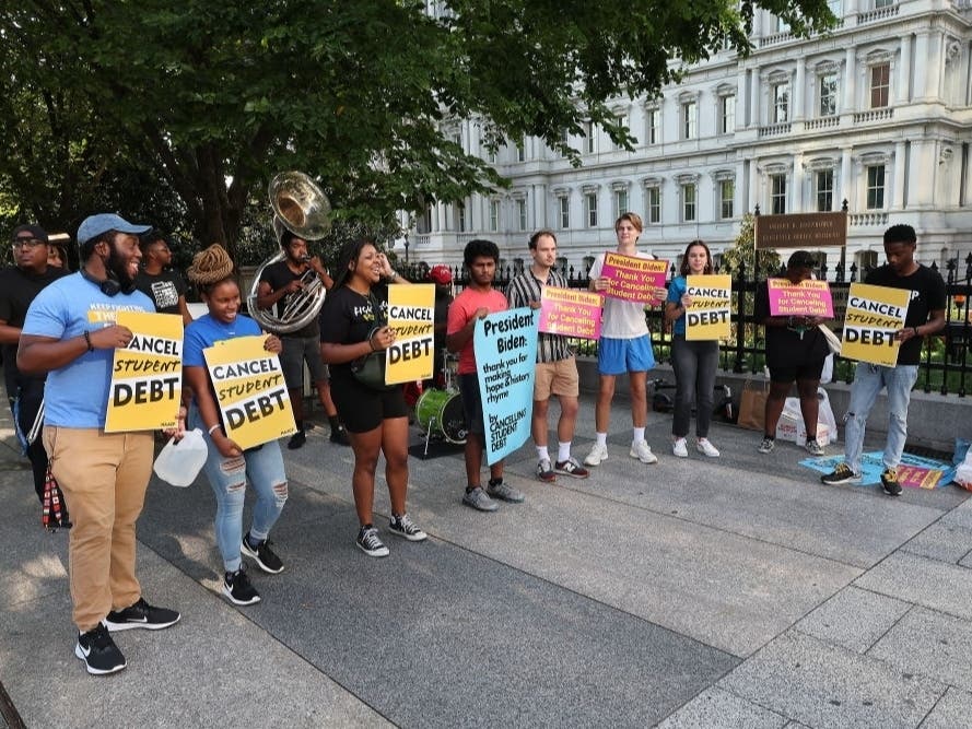Student loan borrowers stage a rally in front of The White House to celebrate President Biden cancelling student debt and to begin the fight to cancel any remaining debt on August 25, 2022 in Washington, D.C.