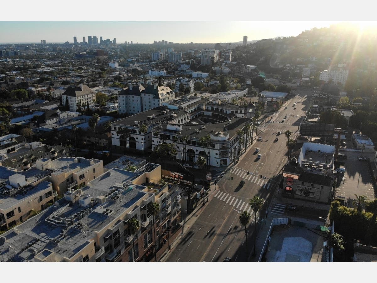 An aerial view shows light traffic passing on Sunset Boulevard during what would normally be the evening rush hour, amidst the coronavirus pandemic, on April 15, 2020 in Los Angeles, California. Environmental Protection Agency (EPA) data from March shows 