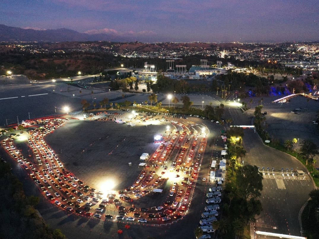  In an aerial view from a drone, vehicles line up at a COVID-19 testing site at Dodger Stadium ahead of the New Year’s holiday on December 30, 2020 in Los Angeles, California.