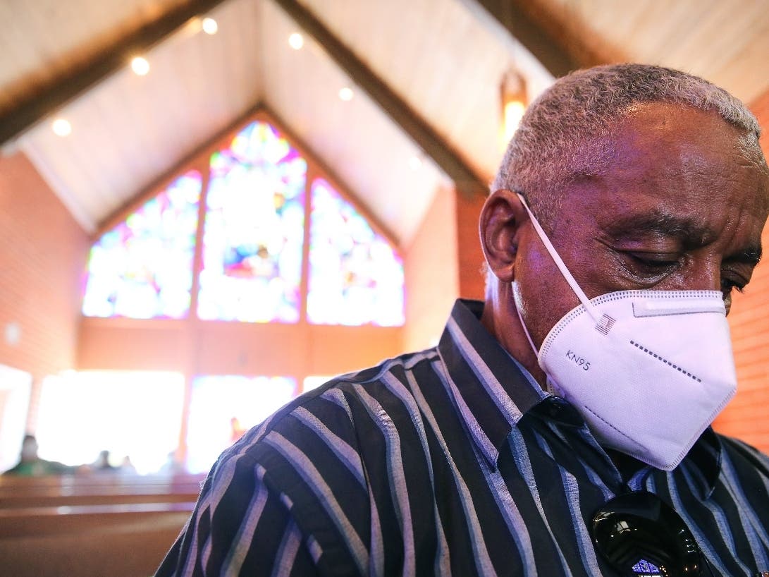 Actor K.J. Rasheed sits in the observation area after receiving his second dose of the Moderna COVID-19 vaccine at Lincoln Memorial Congregational Church UCC on March 12, 2021 in Los Angeles, California.