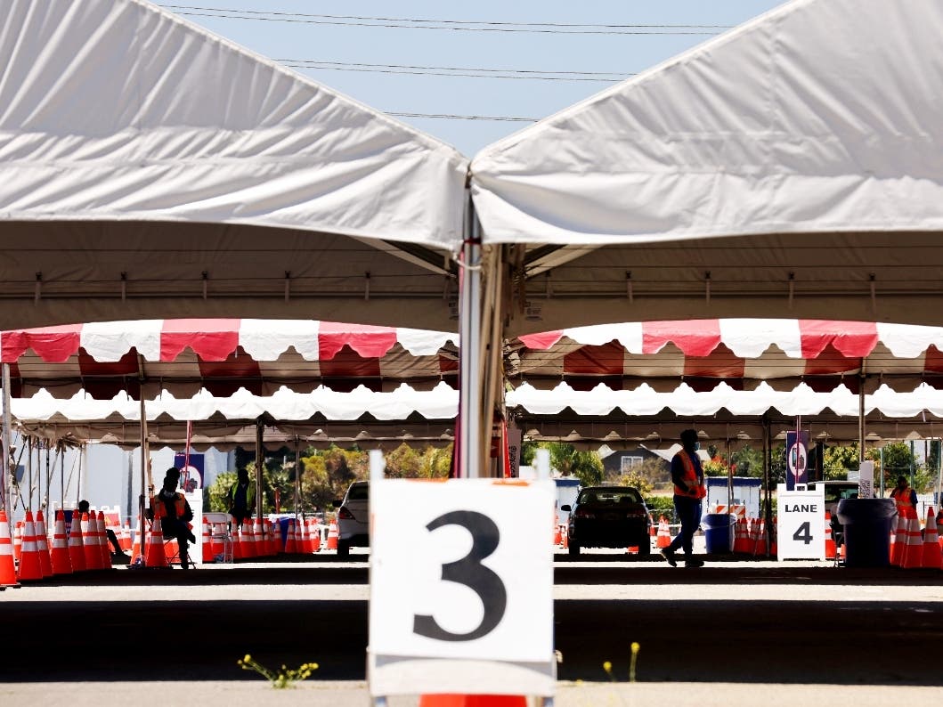 A drive through mass vaccination site at the Pomona Fairplex is nearly empty on June 10 in Pomona. The rate of coronavirus (COVID-19) vaccinations has dropped since peaking in April, putting in jeopardy the goal of having 70 percent of adults vaccinated.