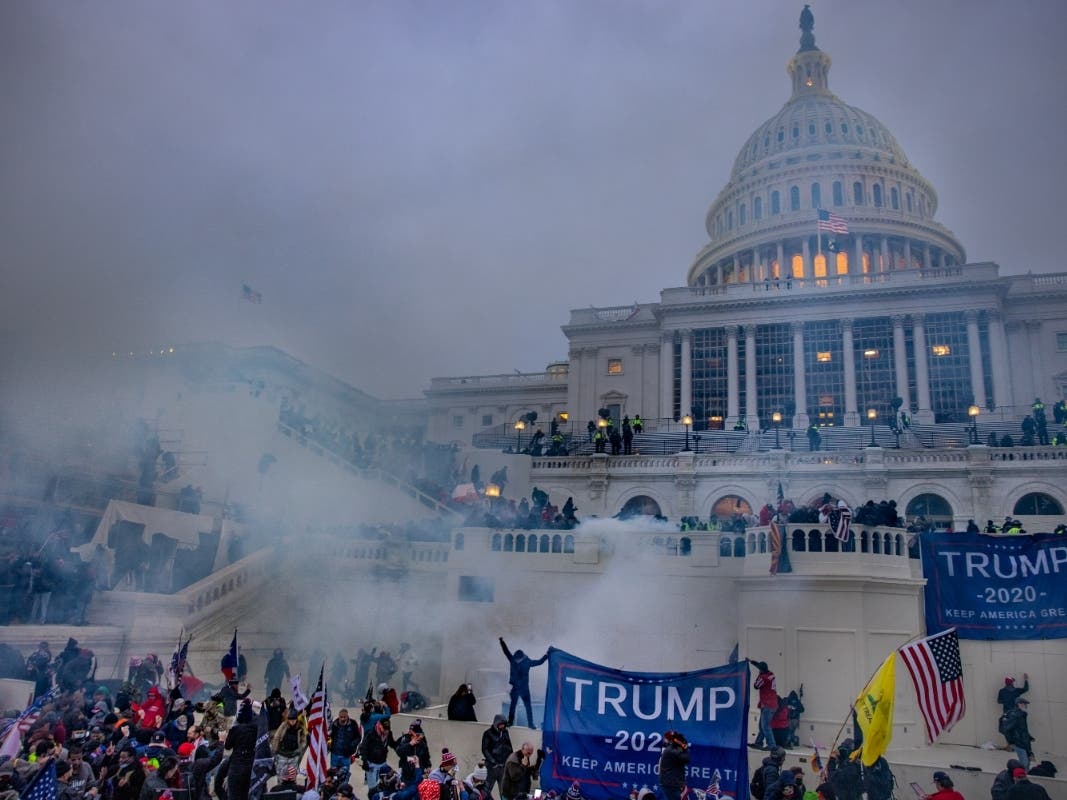 WASHINGTON,DC-JAN6: Tear gas is fired at supporters of President Trump who stormed the United States Capitol building.