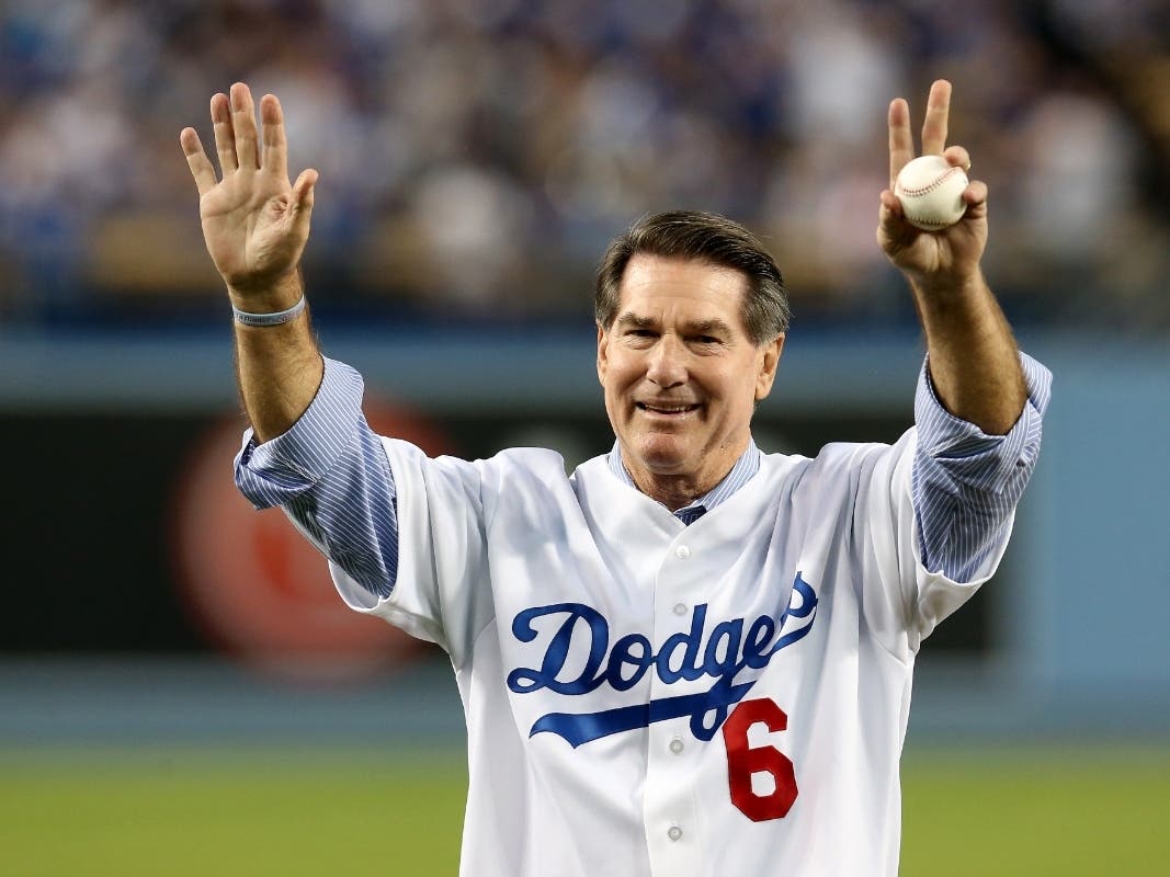 Los Angeles Dodgers legend Steve Garvey throws out a ceremonial first pitch before the Dodgers take on the Atlanta Braves. Garvey is said to be considering a run for U.S. Senate.