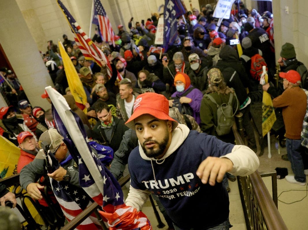 Protesters enter the U.S. Capitol Building on January 06, 2021 in Washington, DC. Congress held a joint session today to ratify President-elect Joe Biden's 306-232 Electoral College win over President Donald Trump. 