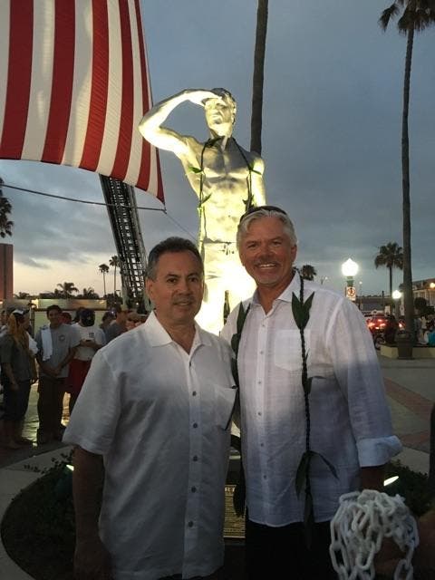 Javier Valdivieso (l.), the owner of ADM Manufacturing, posed with Ben Carlson's father (r).