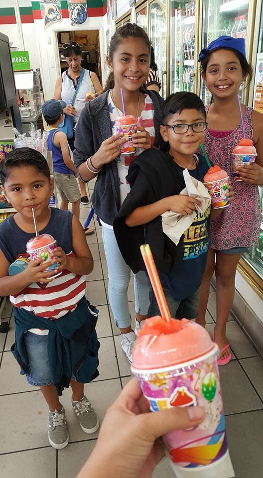 Mother Eva Gee took her brood to an Anaheim area 7-11 for free Slurpees in the OC