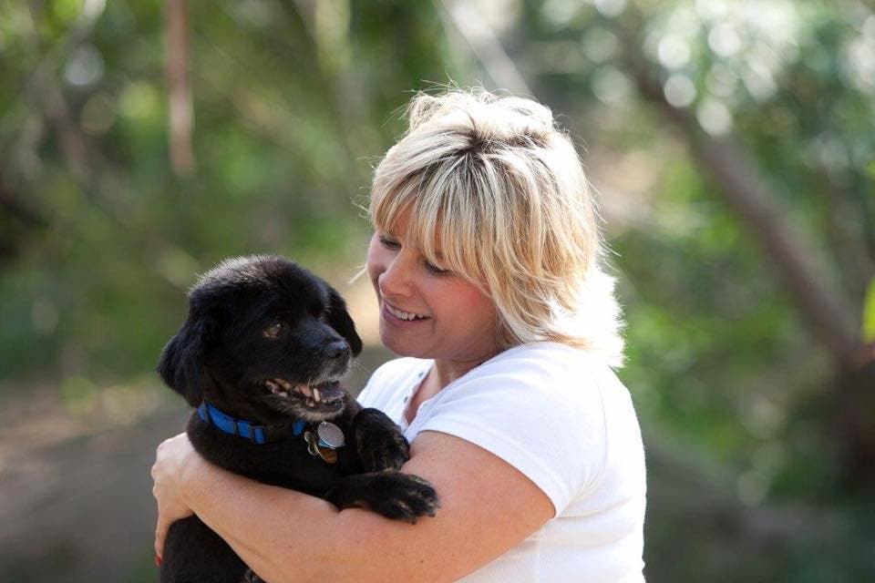 Natalie Huggins and Her adopted rescue dog, Courtesy