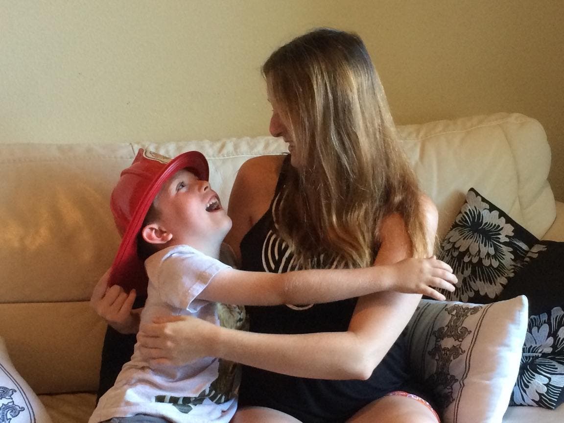 Danielle and Sawyer, together at home after 6-year-old calls 911 and saves his mom and unborn baby sister, Orange County Fire Authority photo