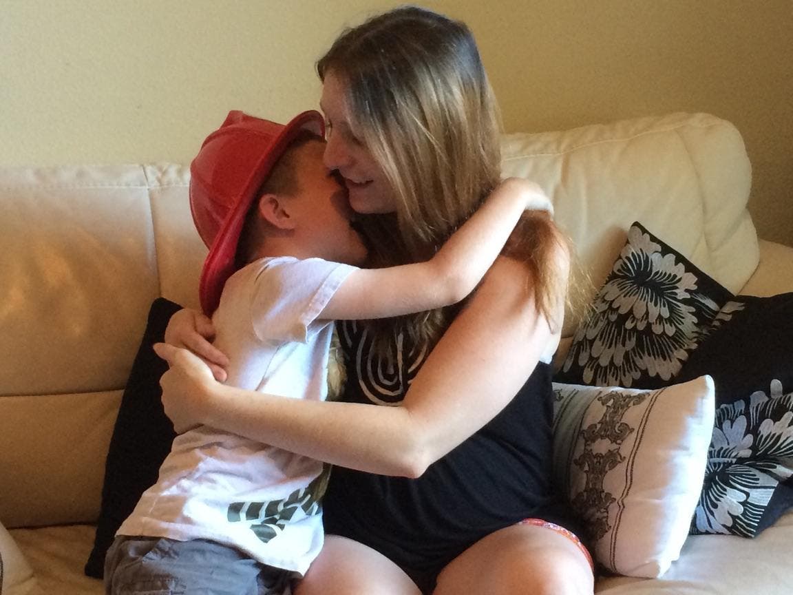 Danielle and Sawyer, together at home after 6-year-old calls 911 and saves his mom and unborn baby sister, Orange County Fire Authority photo