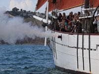 cannons blast tall ships