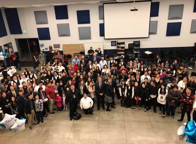 Walnut High alumni gather after a surprise concert in honor of Buddy Clements.