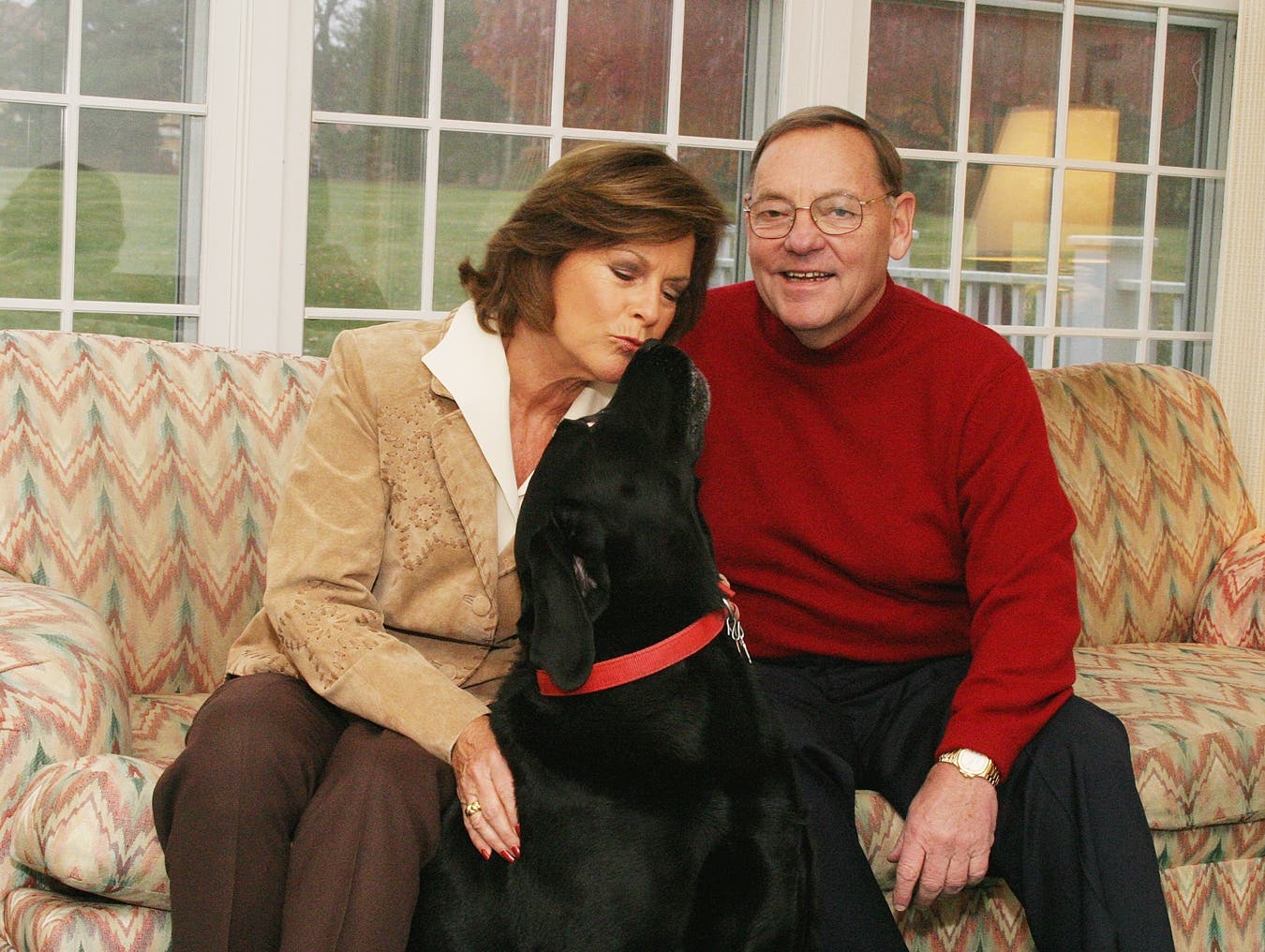 Rita and John Canning with beloved lab, Smokey.