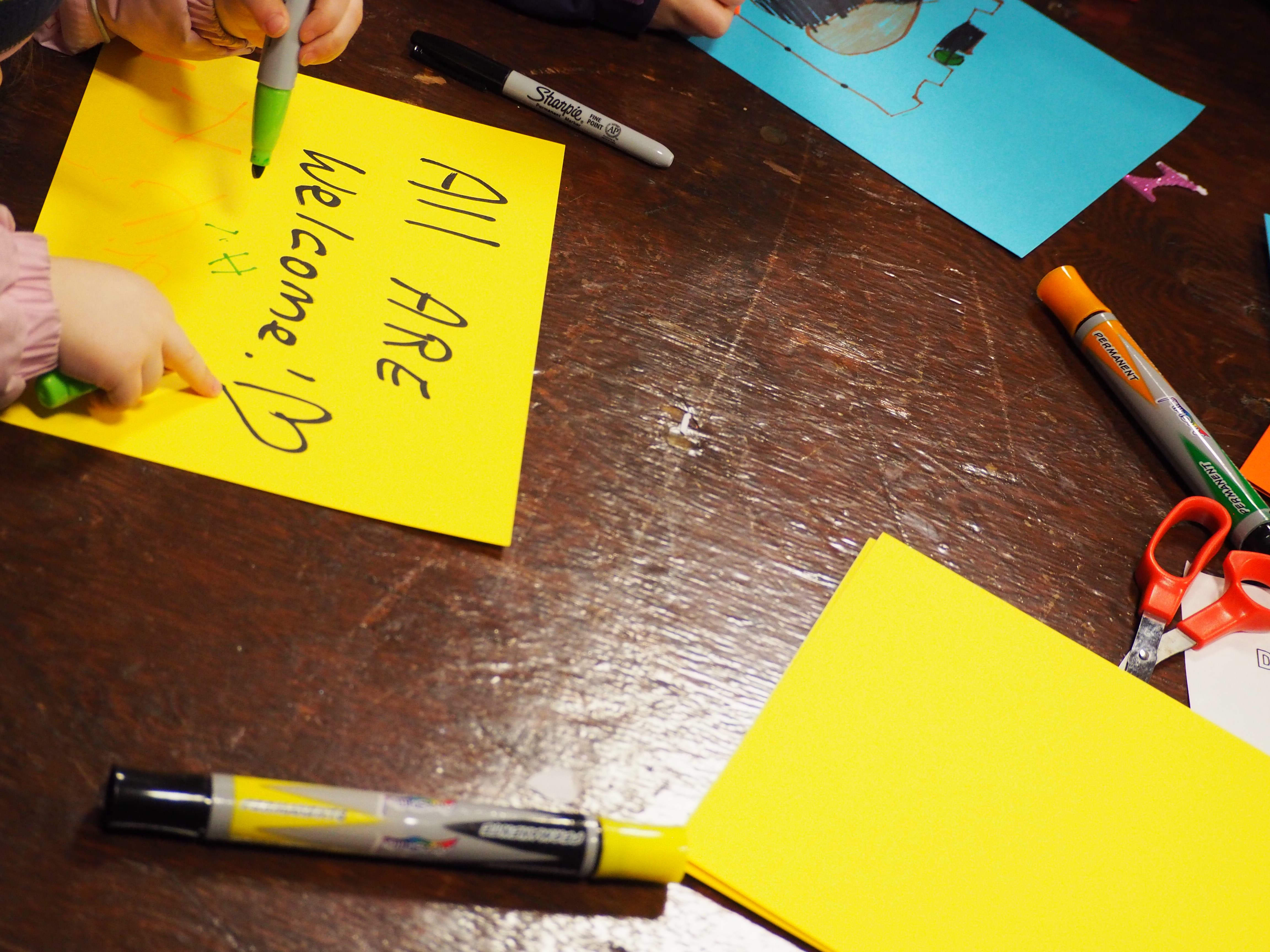 Muslim Community Center in Morton Grove Rally Against Islamophobia and Muslim Ban A young girl writes on a sign at the Muslim Community Center in Morton Grove before a January 29 march 