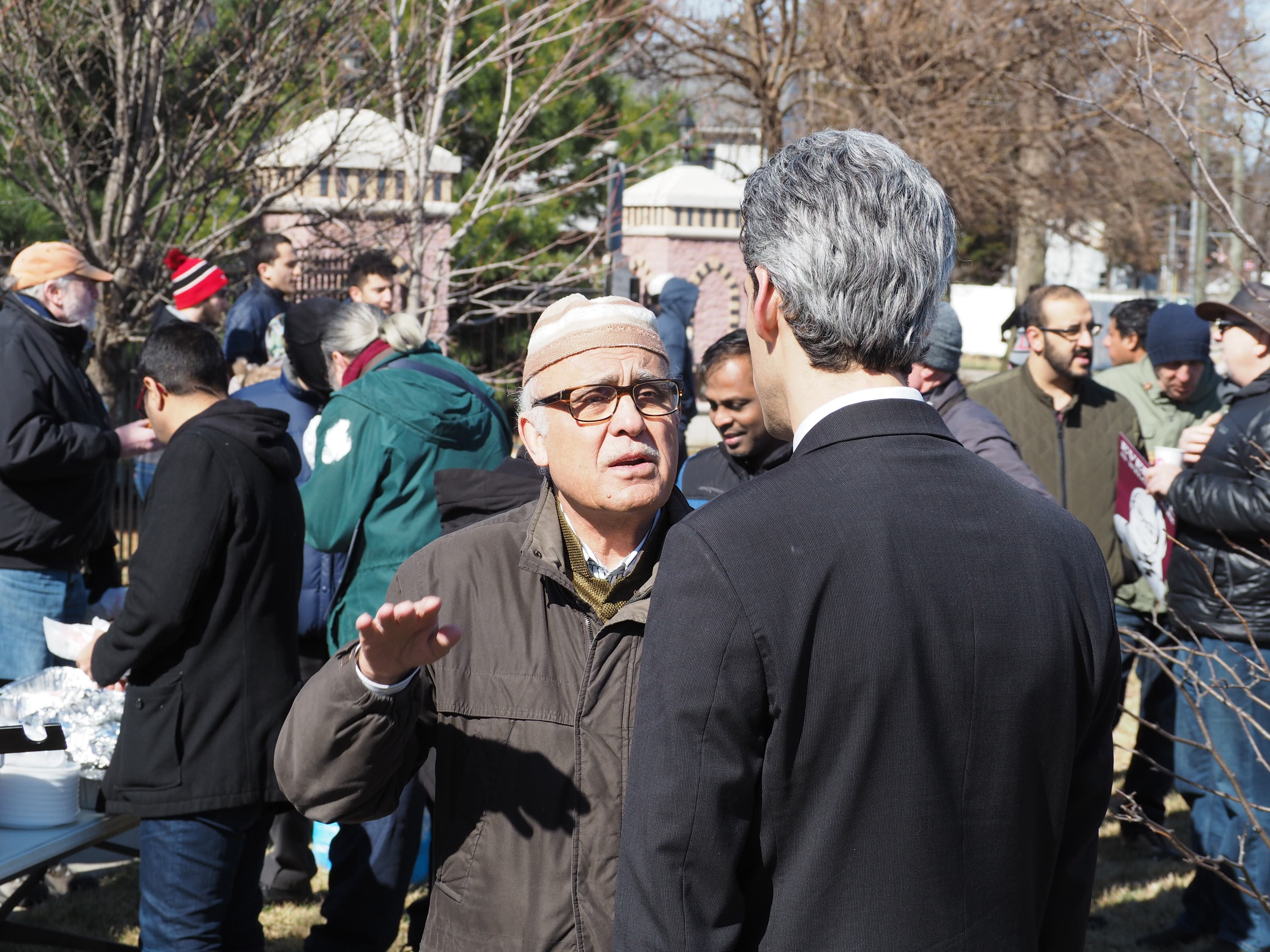 Mumtaz Khan of the ICCD speaks with Sen. Daniel Biss in Des Plaines March 3