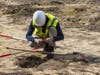 A portion of the 405 Freeway widening project has been shut down after OCTA workers discovered Native American bones, buried in the project area.