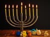 The date of Hanukkah moves around because it's based on the Jewish calendar, which correlates to the sun and moon. 