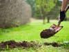 Gardener,Is,Digging,Soil,With,A,Shovel,And,Preparing,To