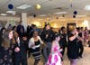 Andrew Student Council members dance with Kennedy students throughout the afternoon at the Kennedy Prom on April 12. 