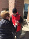 A generous donor gives to a St. Coletta's participant on Friday, April 12. 