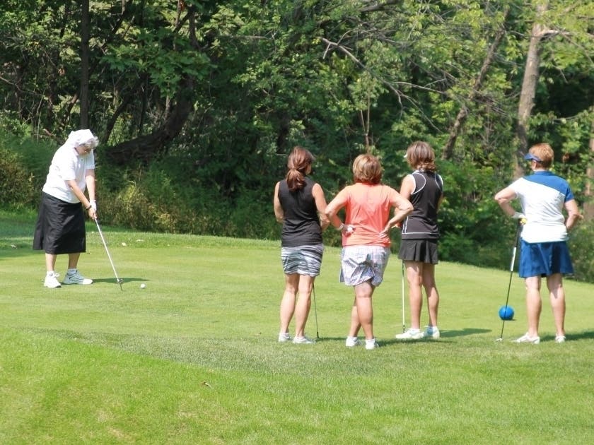 Guests accept the challenge of Sister Maryann Dosen to “Beat the Nun” and the chance to win a Bettenardi putter at the 2