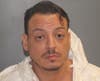 The booking mug shot of Kenton Dalton.