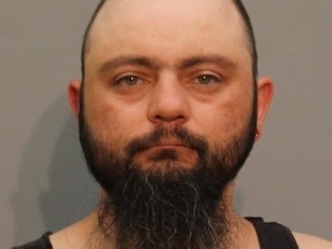 The booking mug shot of Adam Knoff.