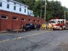 A truck hit one of Vernon's historic mills Tuesday. 