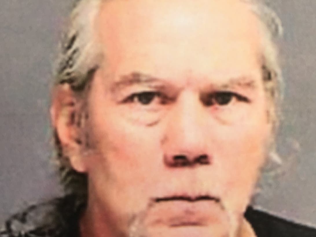 The booking mug shot of John Nelson.