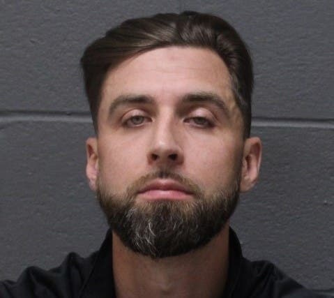 The booking mug shot of Guy Fletcher.