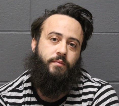 The booking mug shot of Stephen Rosado.