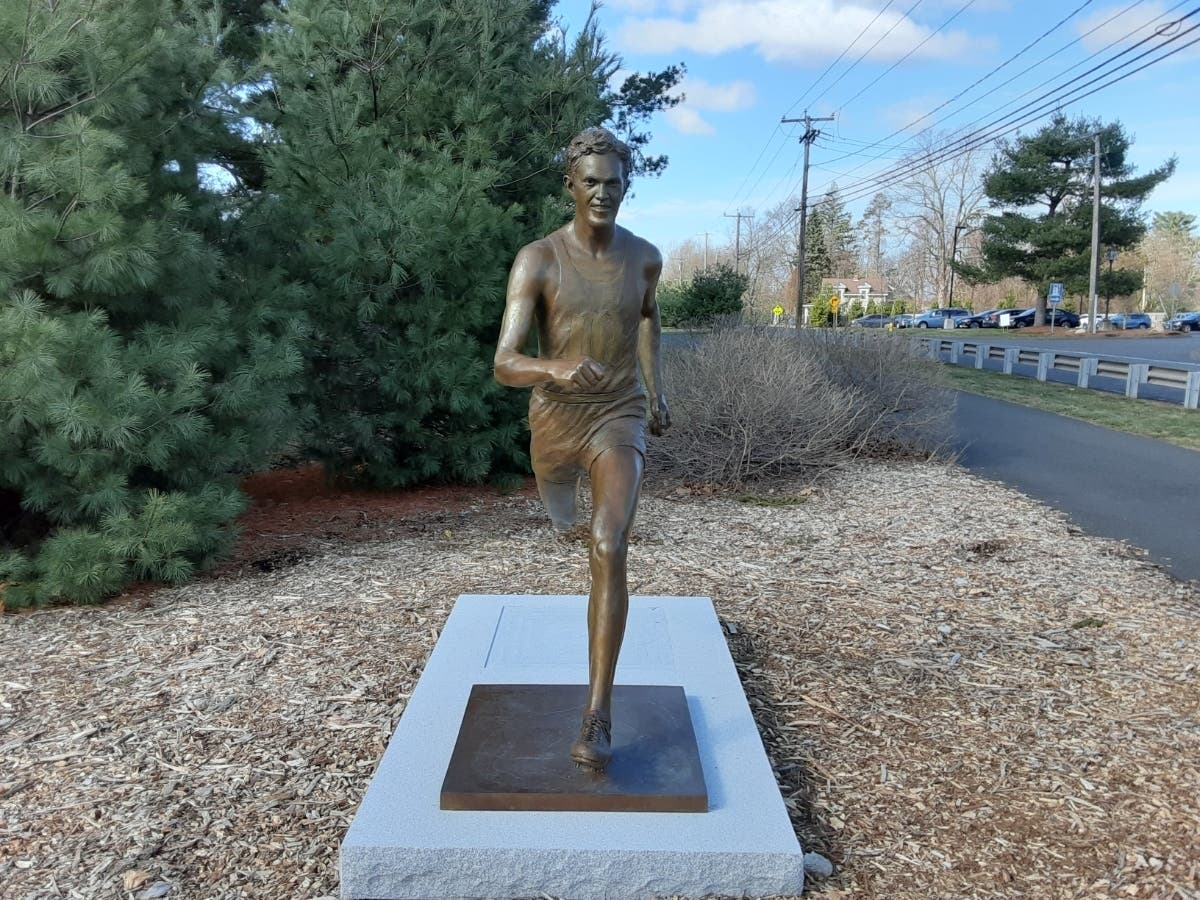 The statue honoring late Olympic medalist Joe McCluskey in Manchester. 