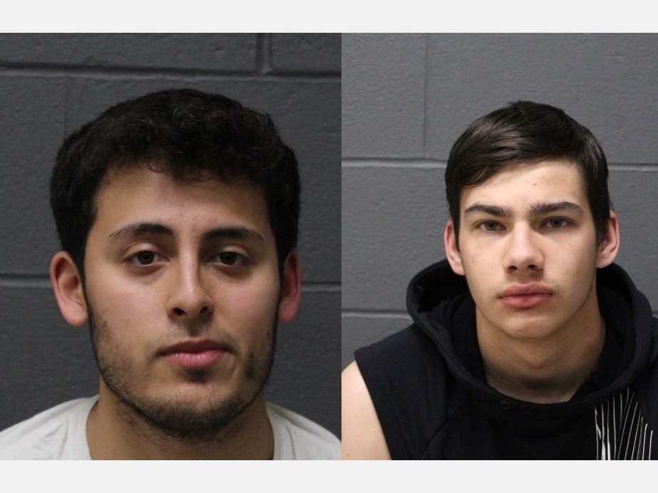 Booking photos of  Carlos Rodriguea-Bilbao (left) and Daniel Marciano.