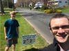 RHS Athletic Director Jeff Farrell took a selfie with Evan Apinis and his senior sign. 