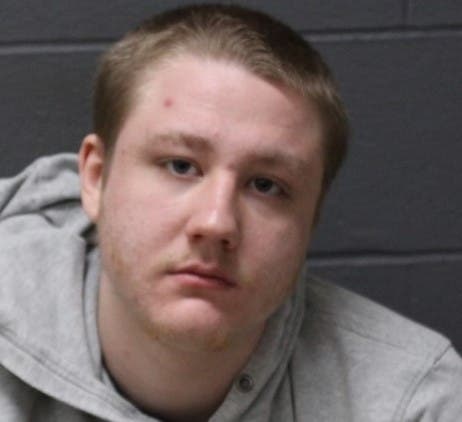 The booking image of Dylan Fournier.